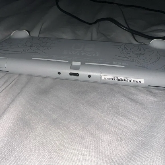 Special Edition 2019 Pokémon Nintendo Switch Lite Gray with Red and Blue Buttons - Picture 3 of 8